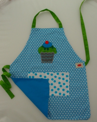 Schürze Kinderschürze Kindergartenschürze grembiule abbigliamento bambini Törtchen cupcake muffin blau blu- MarionP